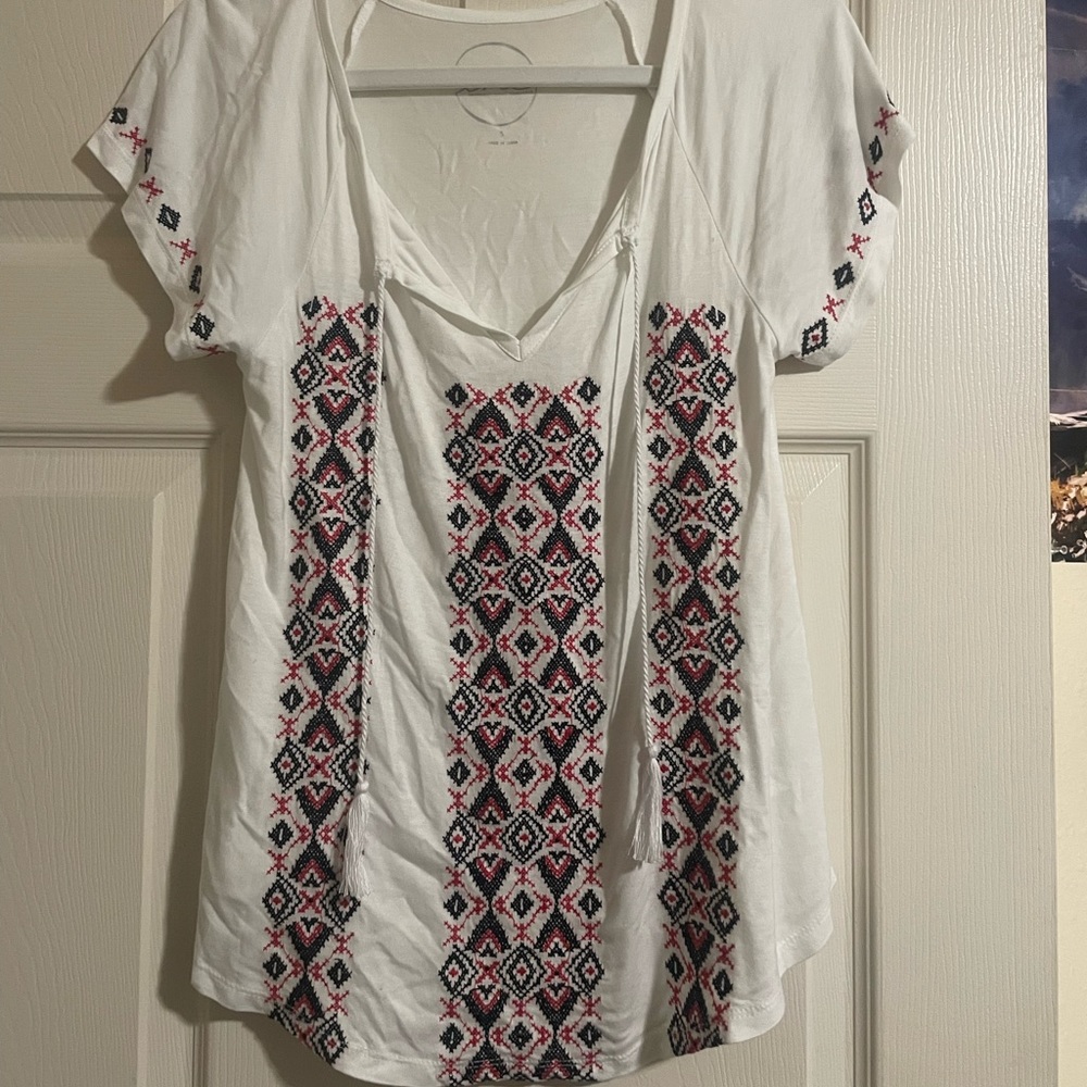 Cute blouse with ties. Brand is INC.